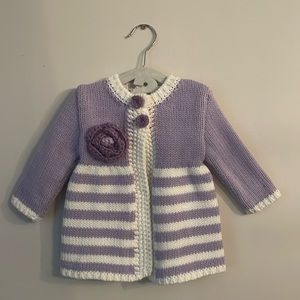 Huggalugs adorable purple & white, hand knit 12-18 months sweater.